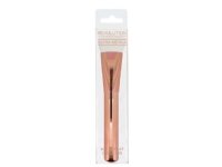 Makeup Revolution brush for contouring the face